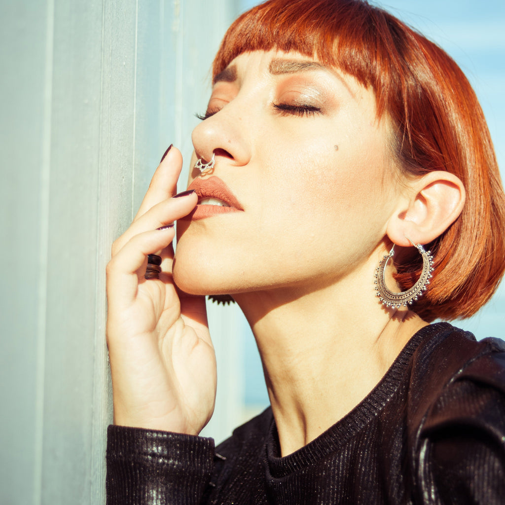 Loto septum piercing