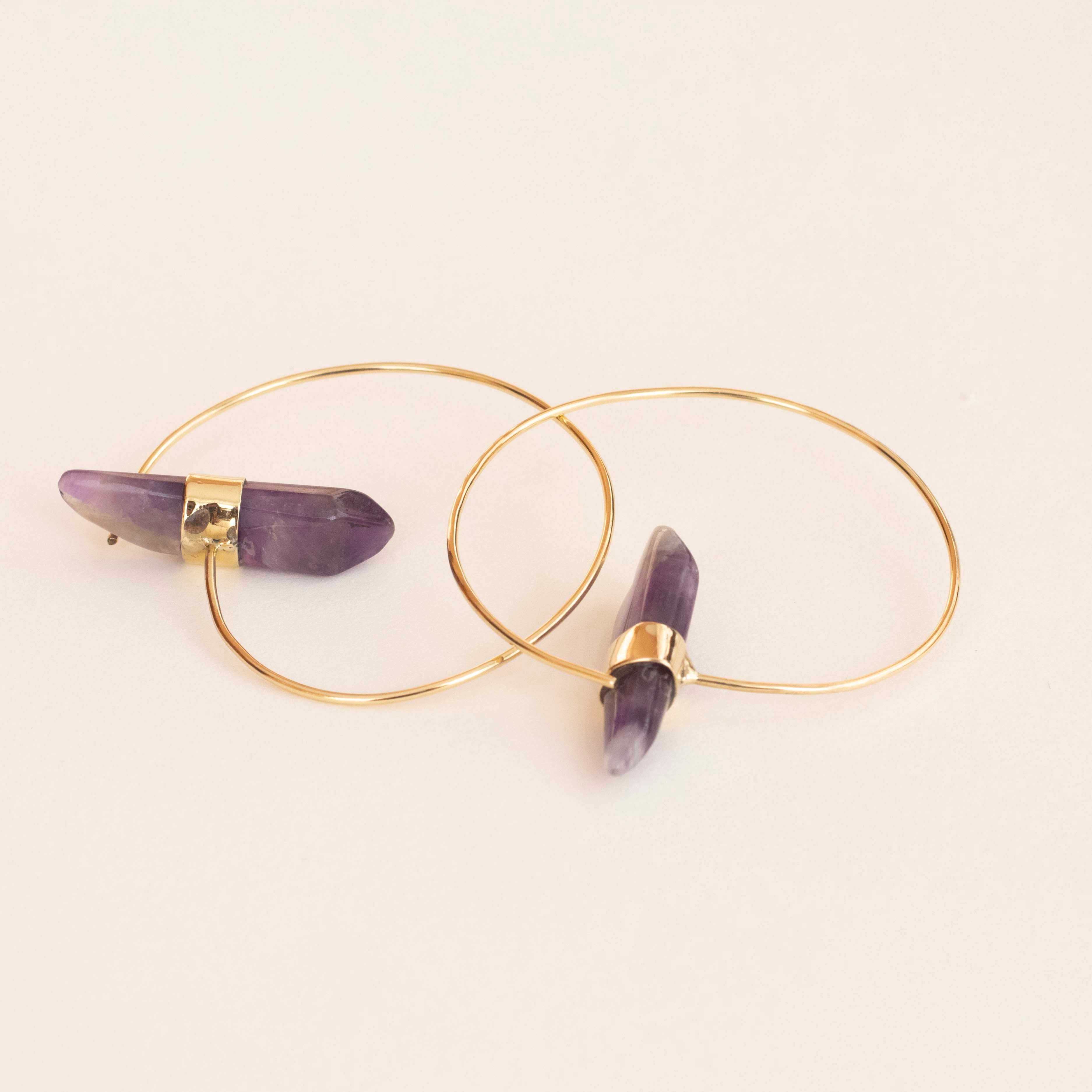 aros amatista fondo blanco